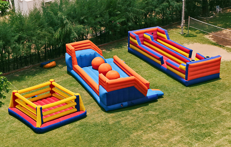 Guests enjoying ring toss activity at inflatable park at Roadies Rostel ARC Resort