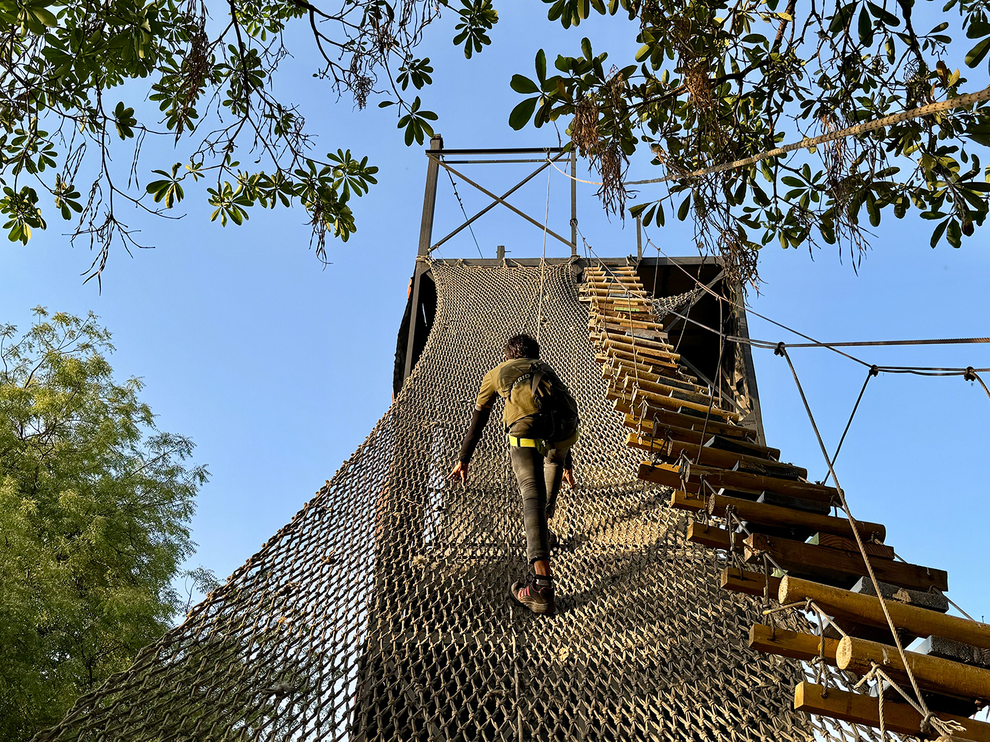 Army net climbing obstacle challenge at Roadies Rostel ARC Resort adventure park near Ahmedabad