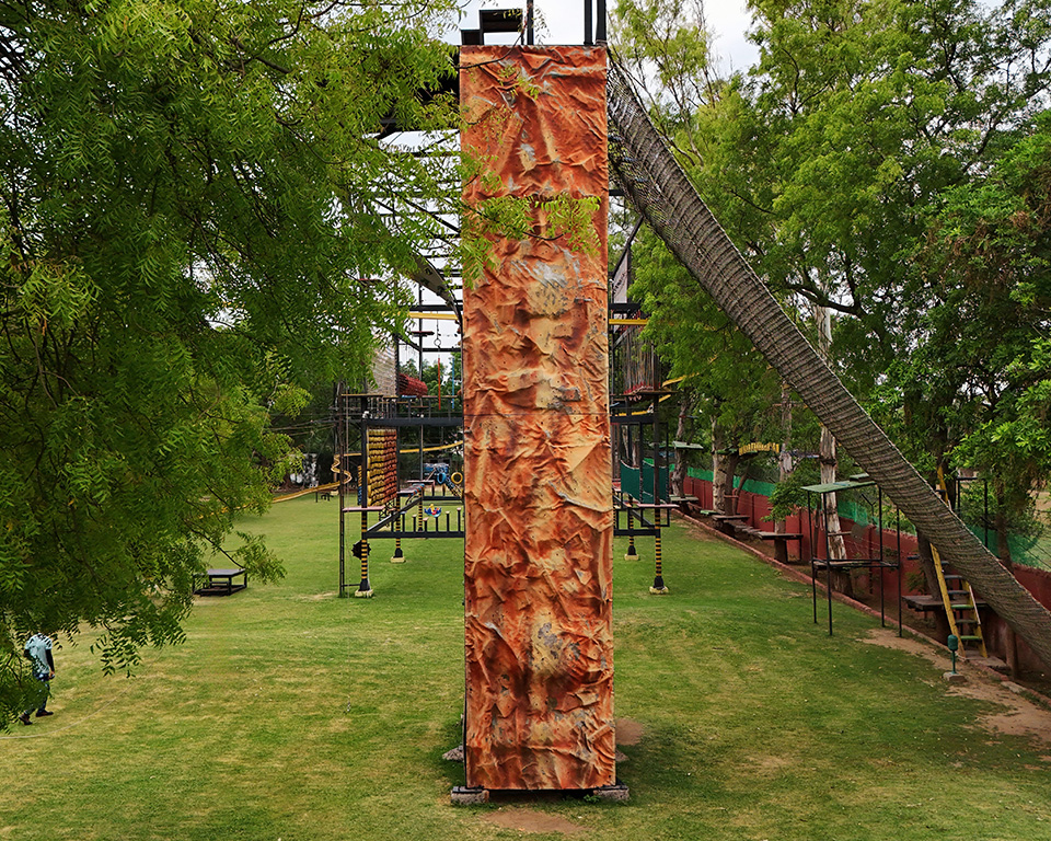 Wide shot of rappelling wall at adventure park in Roadies Rostel ARC Resort near Ahmedabad