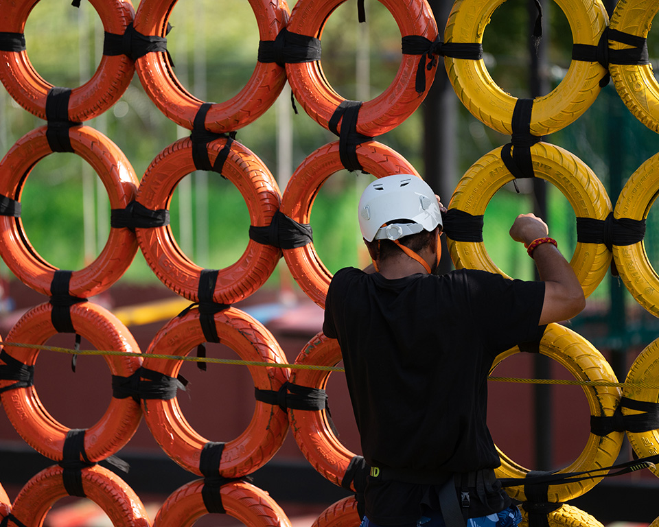 Close-up of tyre obstacle on rope course at Roadies Rostel ARC Resort near Ahmedabad