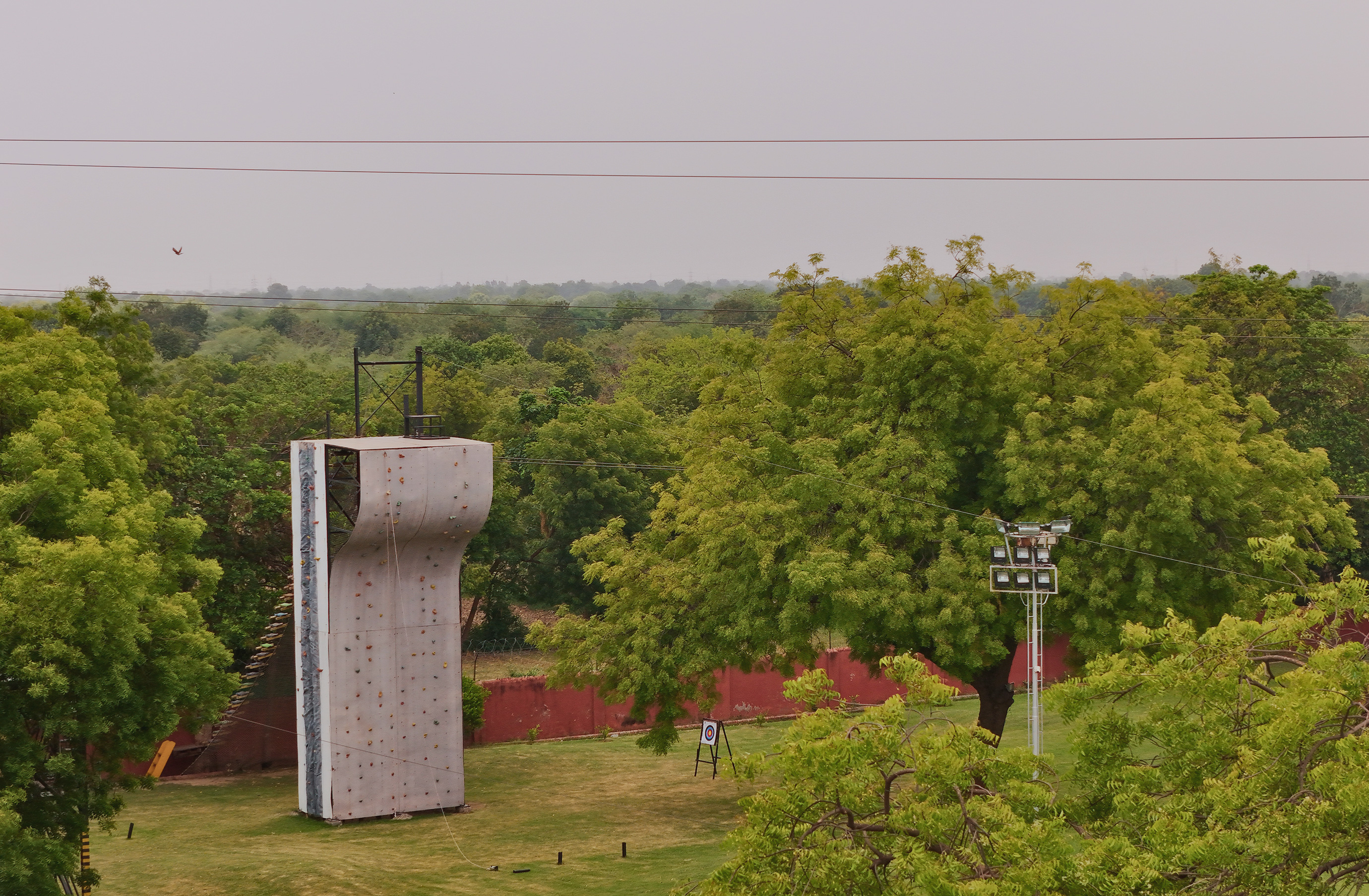 Guest enjoying rollercoaster zipline adventure ride at Roadies Rostel ARC Resort near Ahmedabad