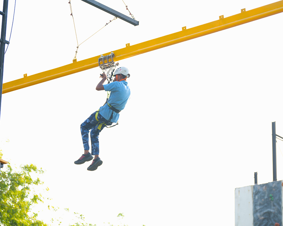 Rollercoaster zipline ride at adventure park in Roadies Rostel ARC Resort near Ahmedabad