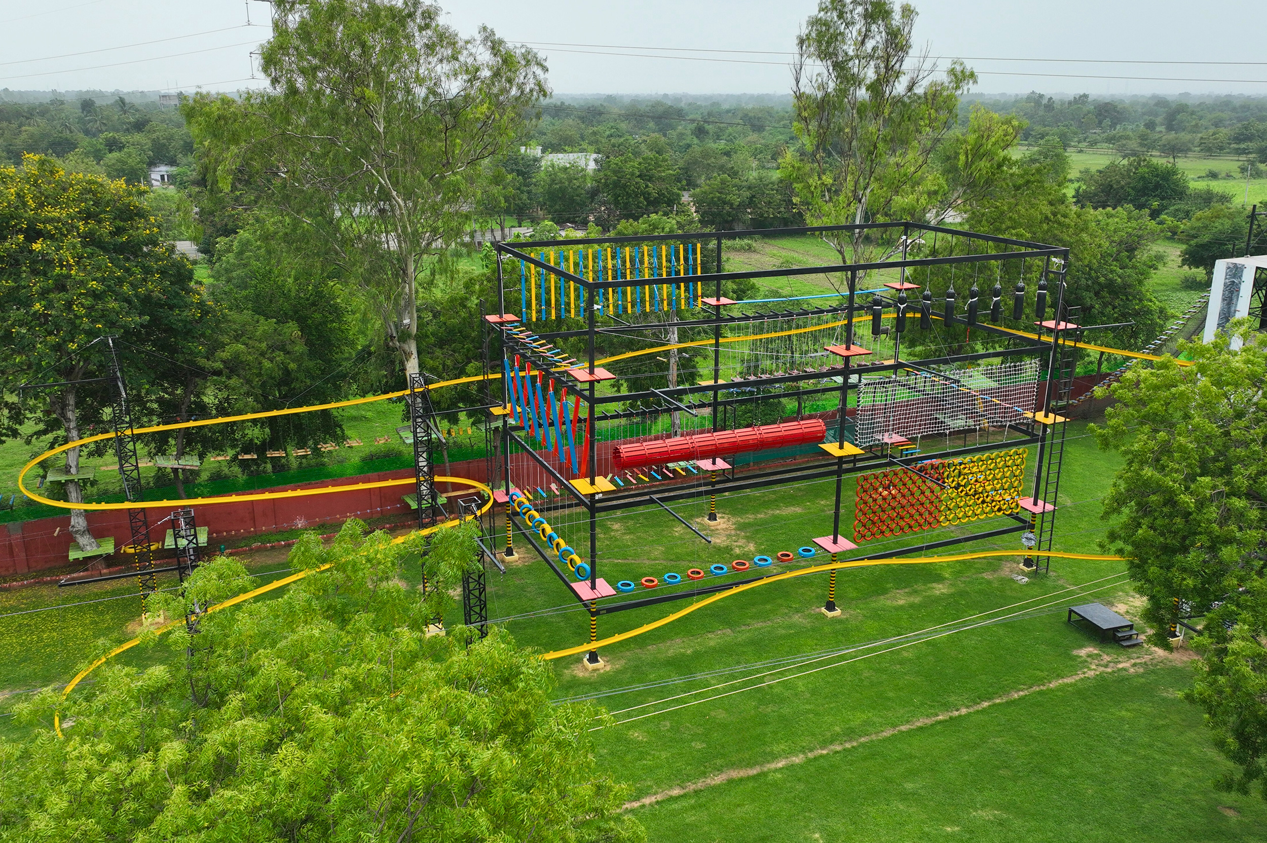 Overview of the adventure park at Roadies Rostel ARC Resort, the best one day picnic resort near Ahmedabad with outdoor activities for all age groups