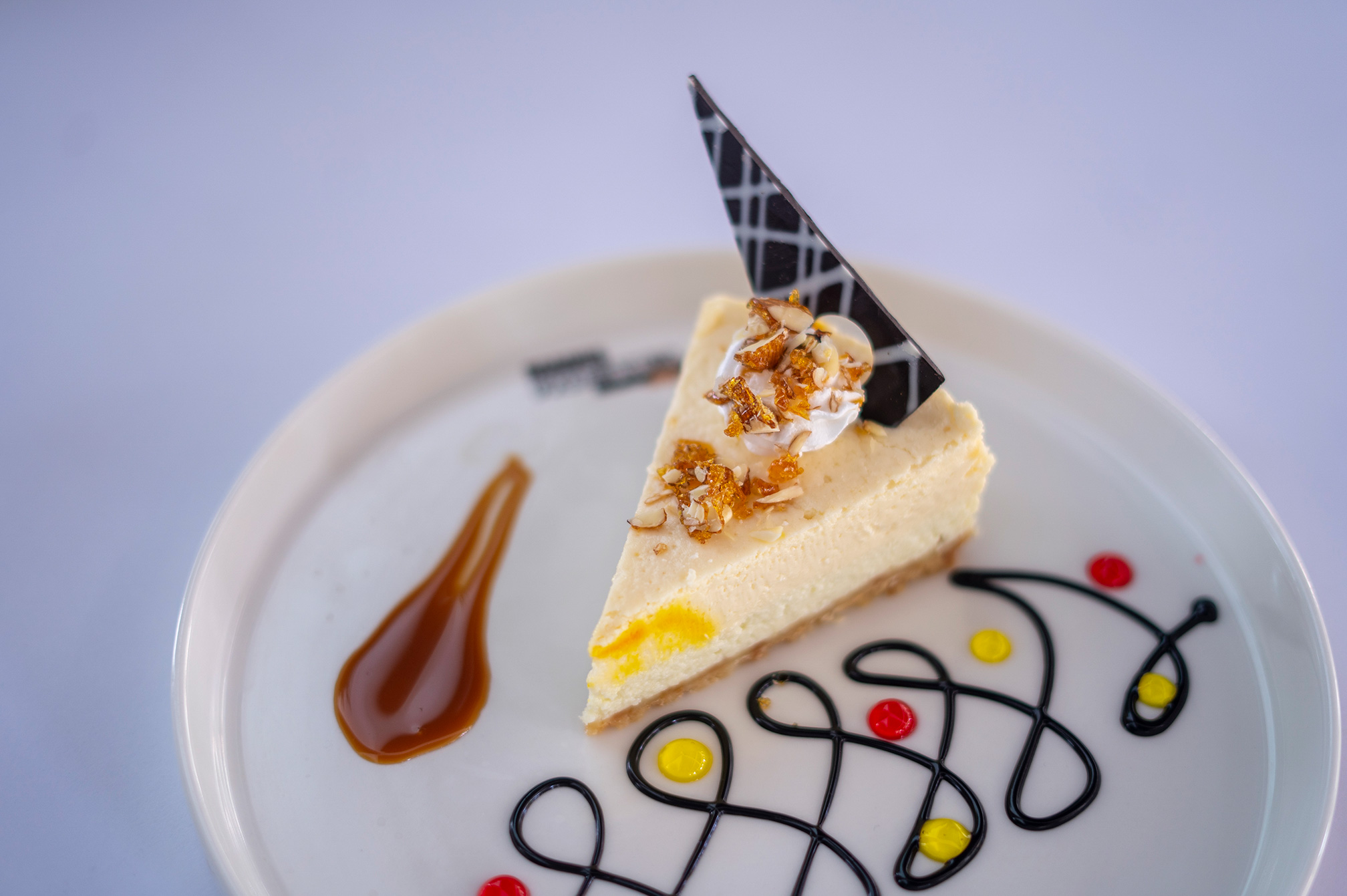 Plated assortment of desserts from the Samyati bakery, offering sweet indulgence at a luxury resort near Ahmedabad.