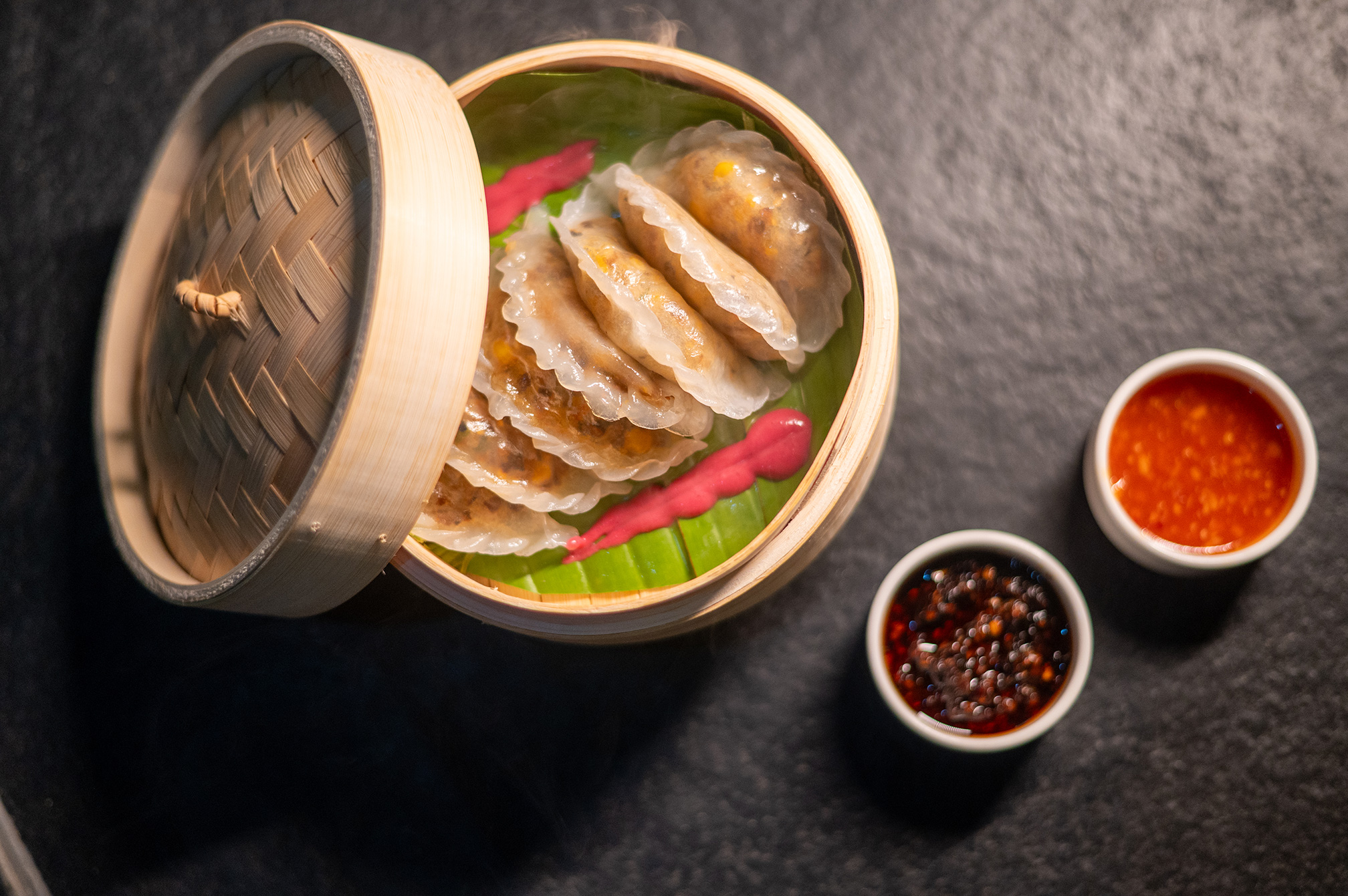 Delicious dim sums served hot at Samyati restaurant, offering an authentic and elegant dining experience near Ahmedabad.