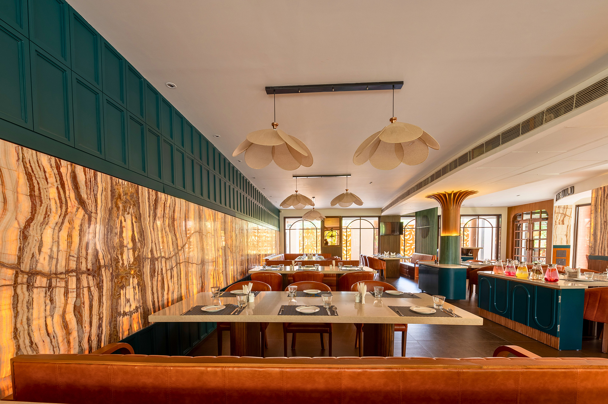 Another view of Samyati’s modern interior, blending rustic charm with contemporary elegance at a top dining destination near Ahmedabad.