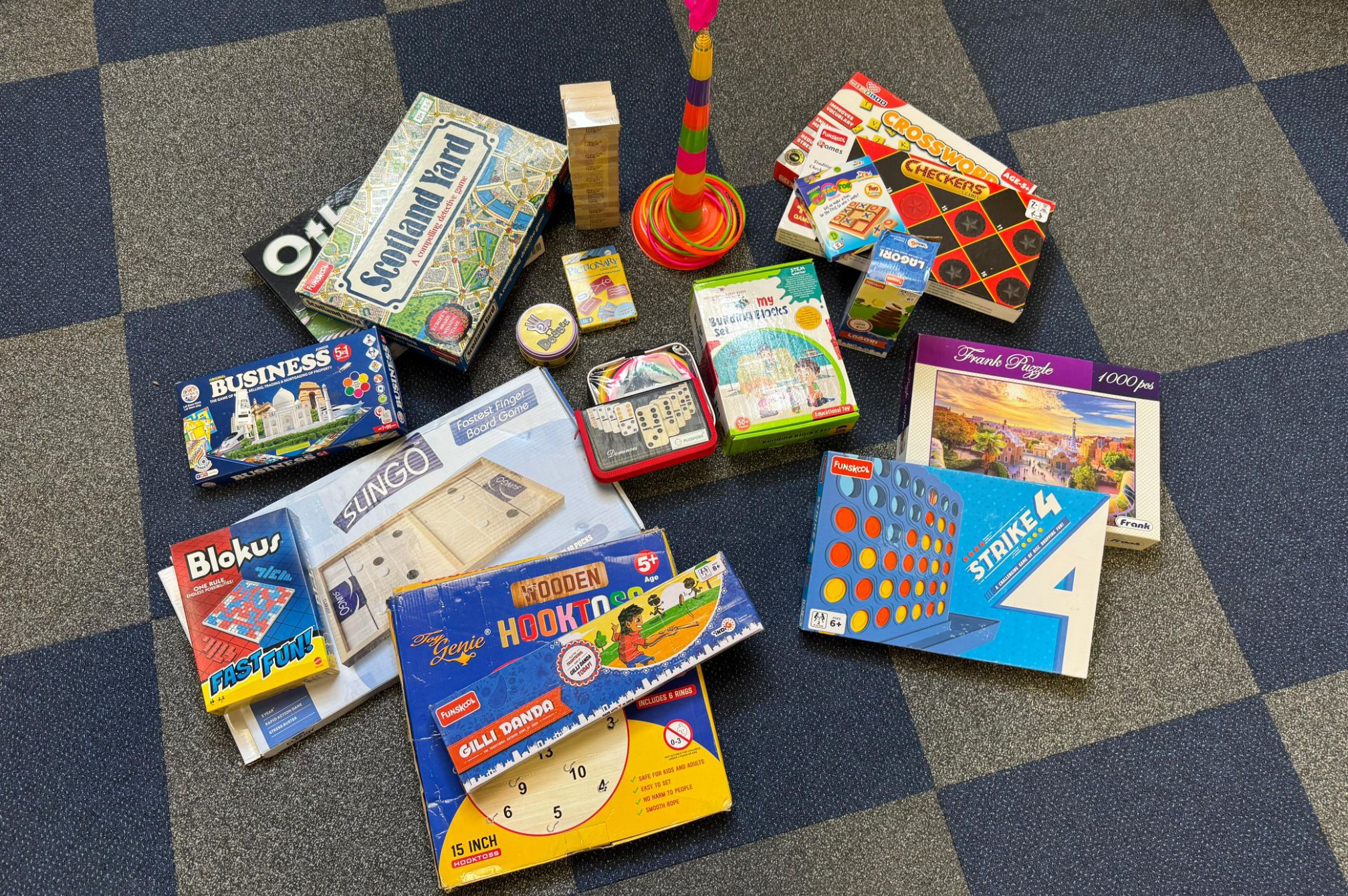 Assorted board games and puzzles available at ARC Resort den