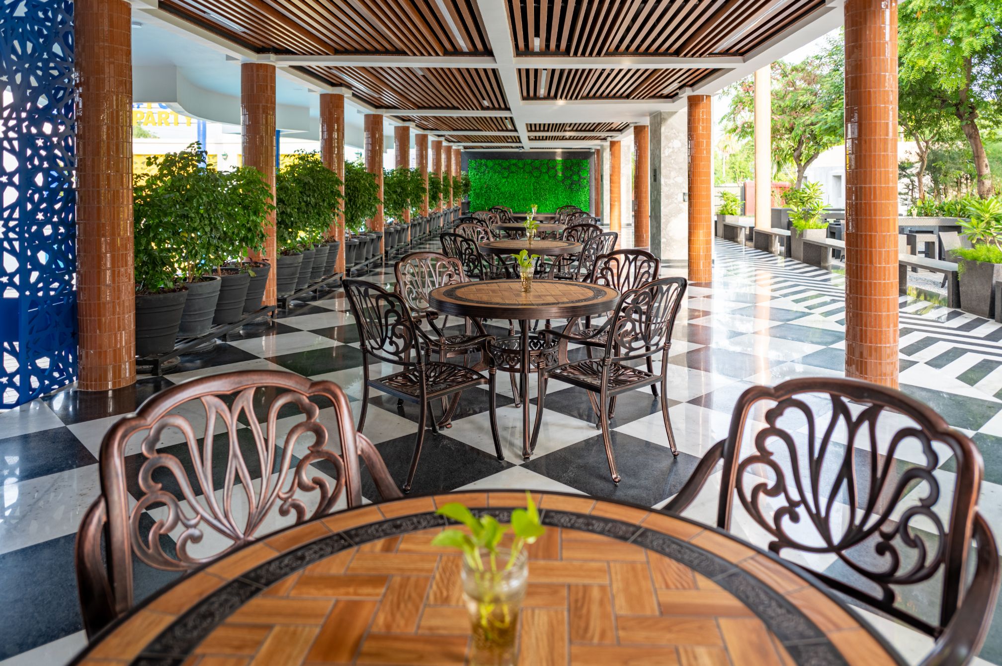 Charming outdoor dining terrace at Roadies Rostel ARC Resort Ahmedabad