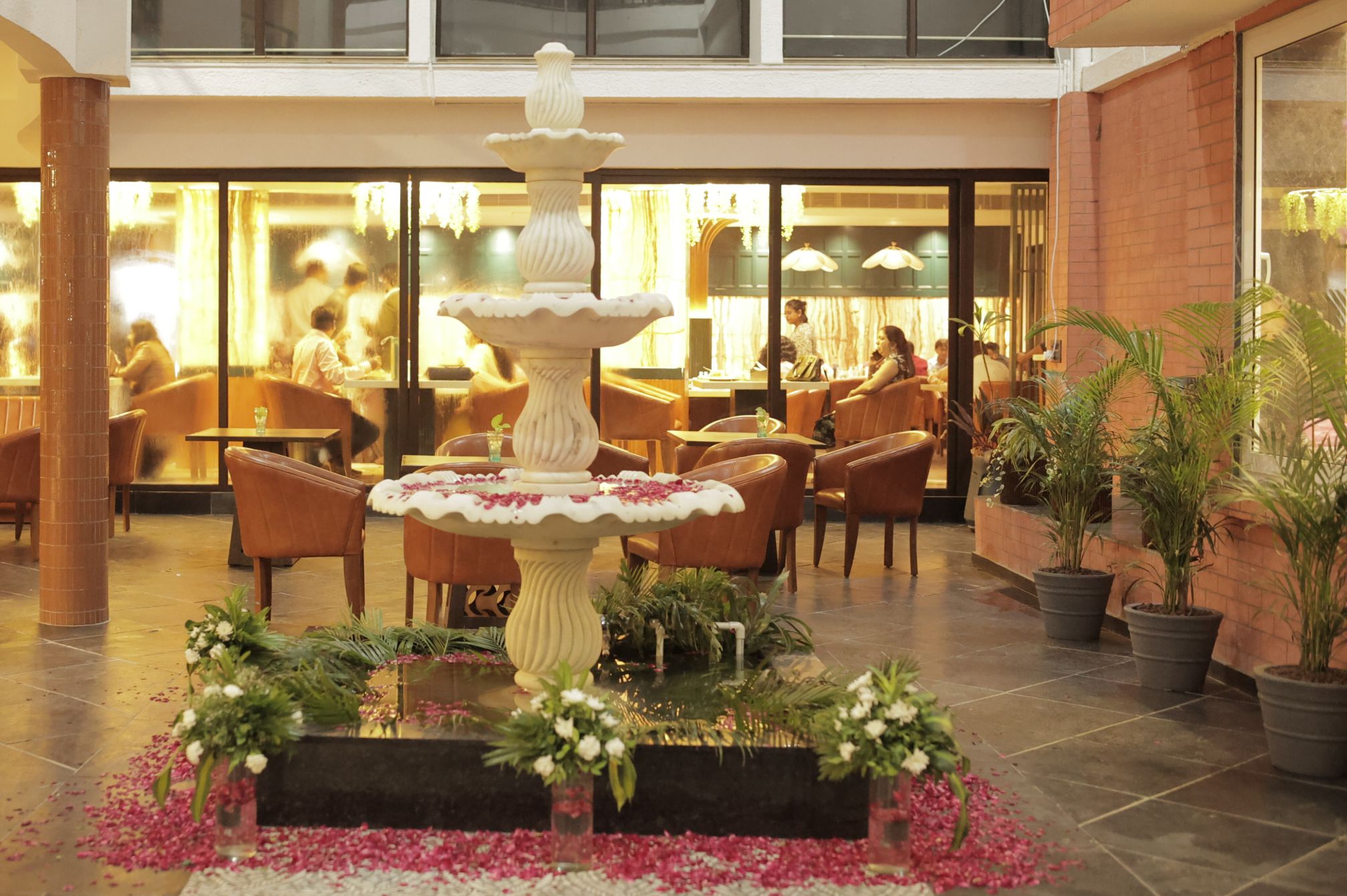 Indoor fountain and seating lounge at the resortâ€™s luxurious lobby entrance