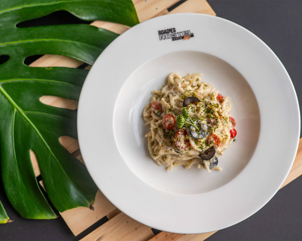 Multi-cuisine food presentation at Roadies Rostel ARC Resort, a perfect destination for foodies in Ahmedabad