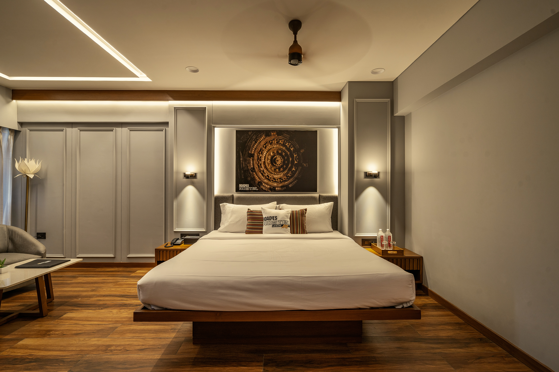 Deluxe Room with plush bedding at the best resort in Ahmedabad, Roadies Rostel ARC