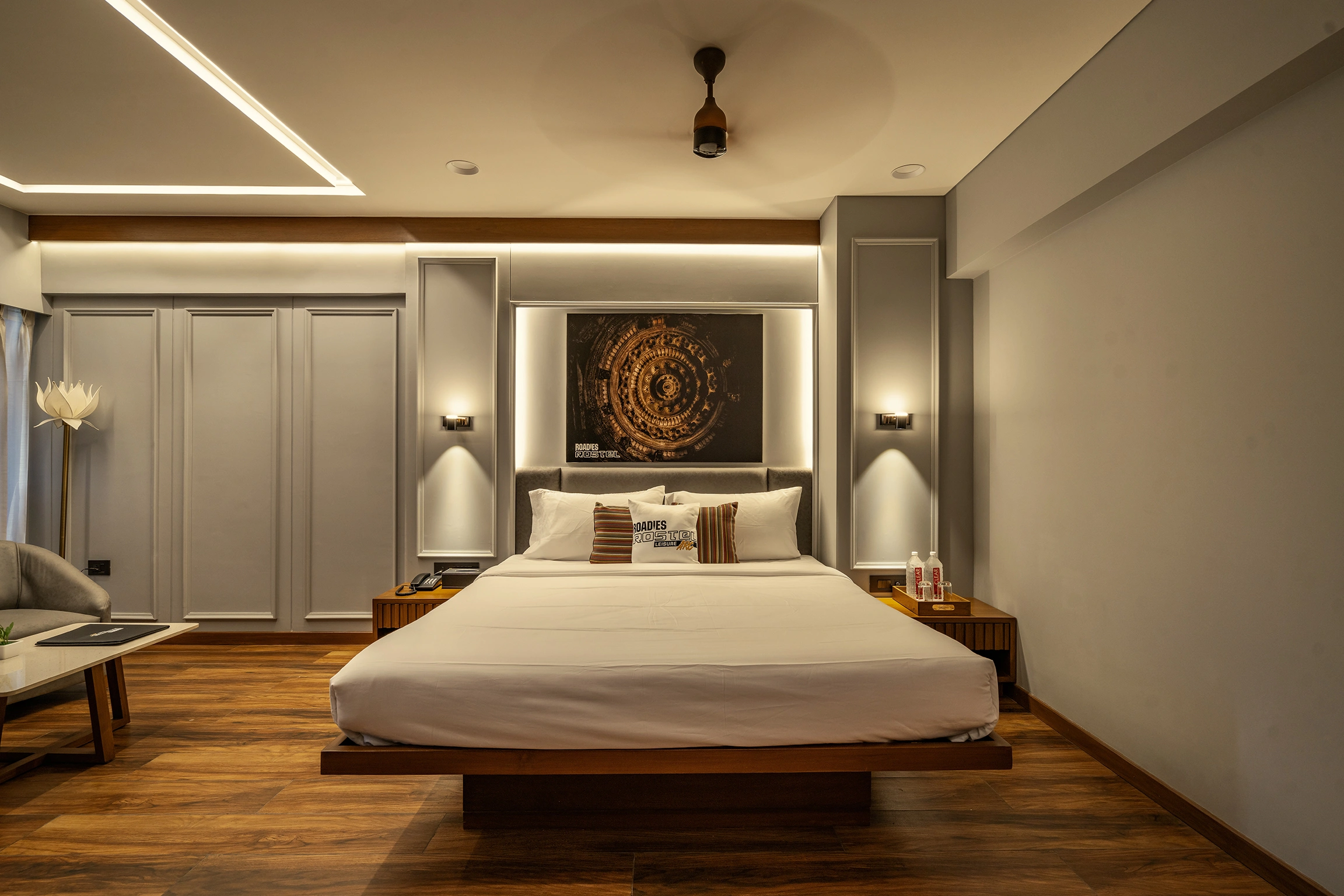 Deluxe Room with plush bedding at the best resort in Ahmedabad, Roadies Rostel ARC