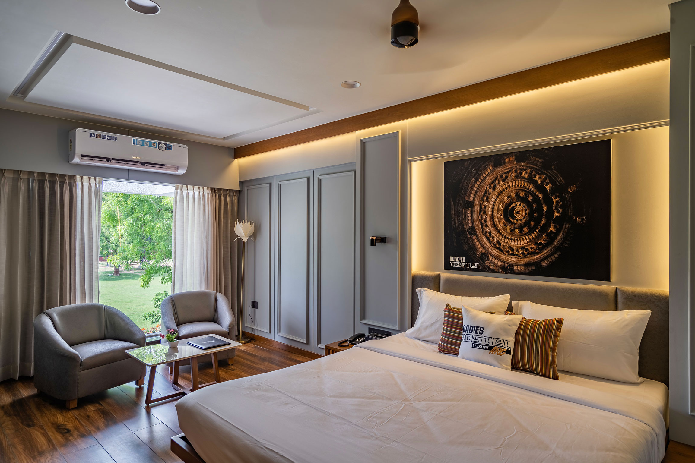 Artistic interior of the Deluxe Room at a top staycation resort near Ahmedabad
