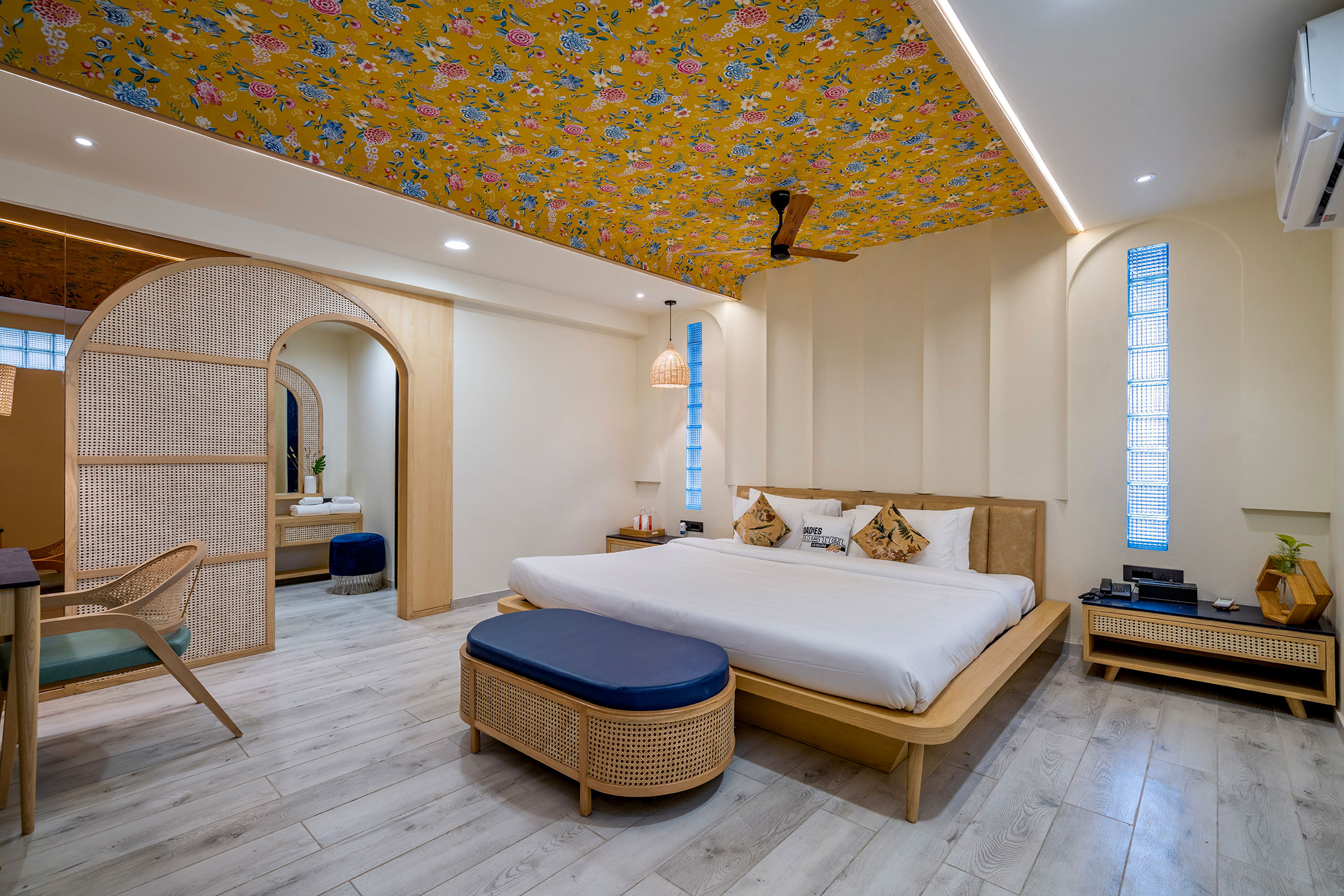 Spacious living room inside the Executive Suite, ideal for team retreats near Ahmedabad