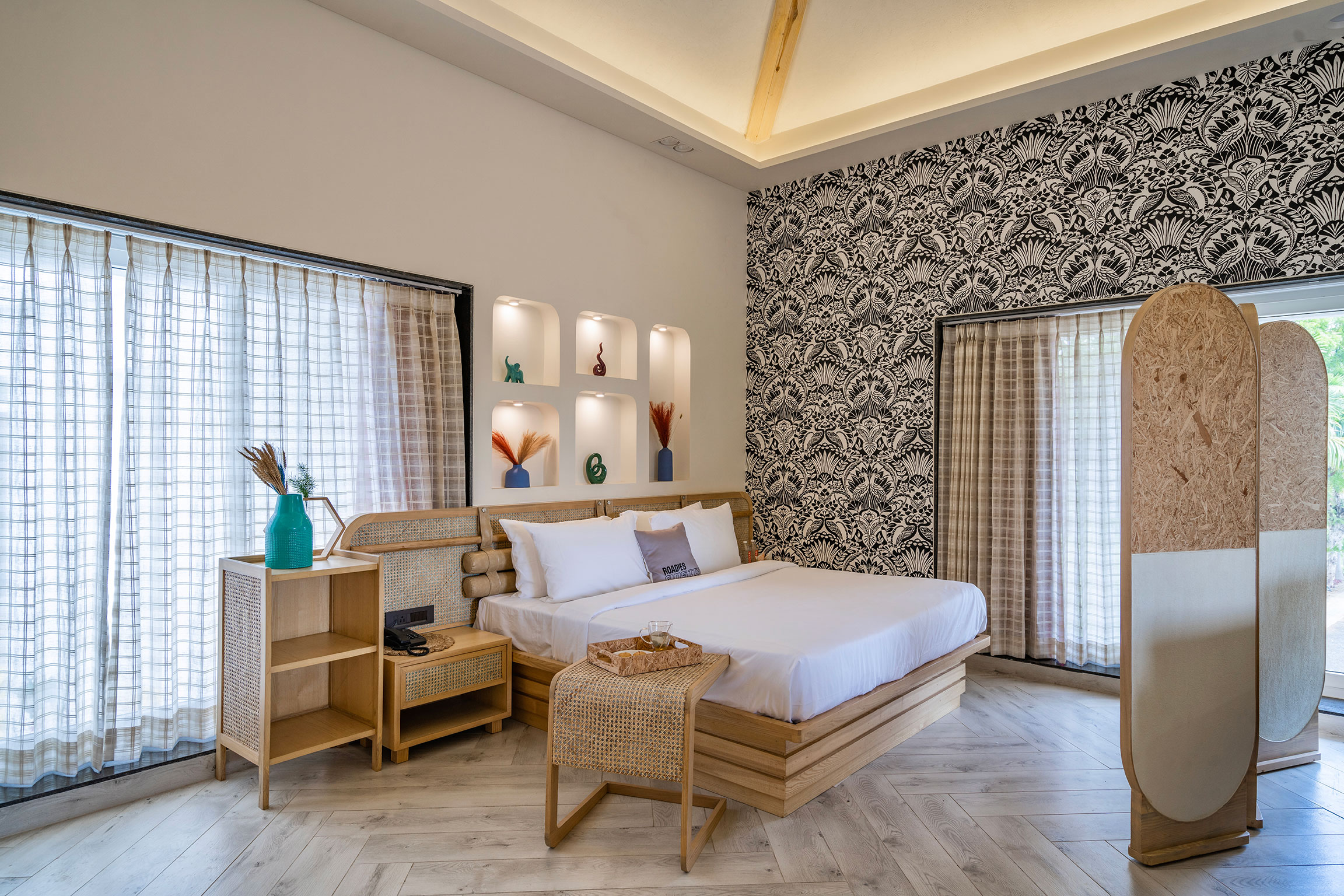 Superior Suite bedroom with elegant decor, perfect for a luxury staycation near Ahmedabad